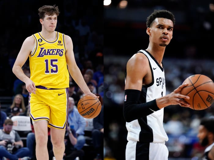 Austin Reaves (left) and Victor Wembanyama.